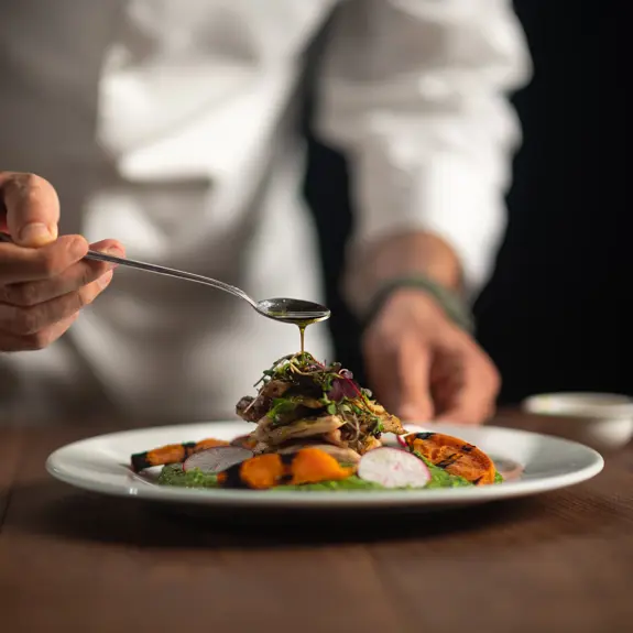 Chef With On Plate Of Food